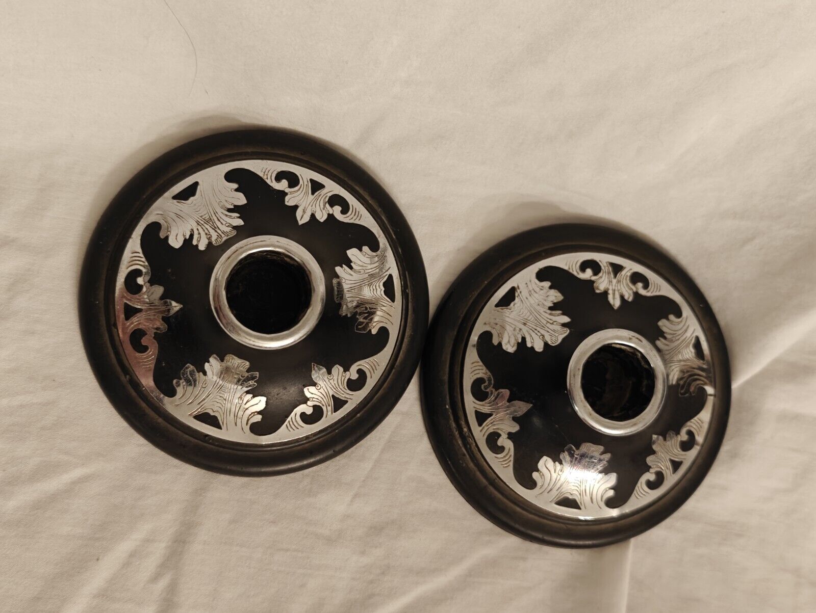 Two Satin Black Harvite/Silver Inlaid Candle Holders