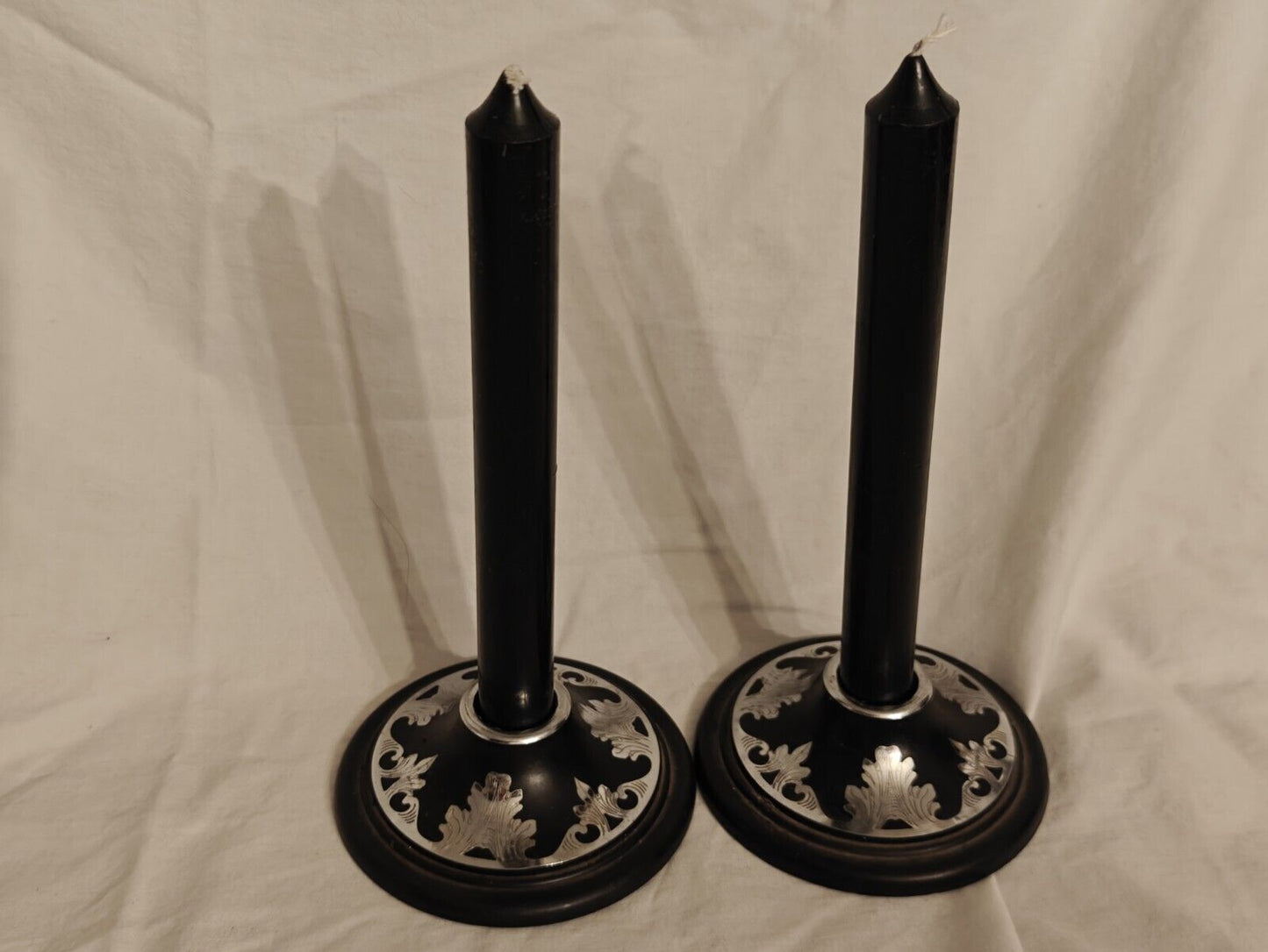 Two Satin Black Harvite/Silver Inlaid Candle Holders